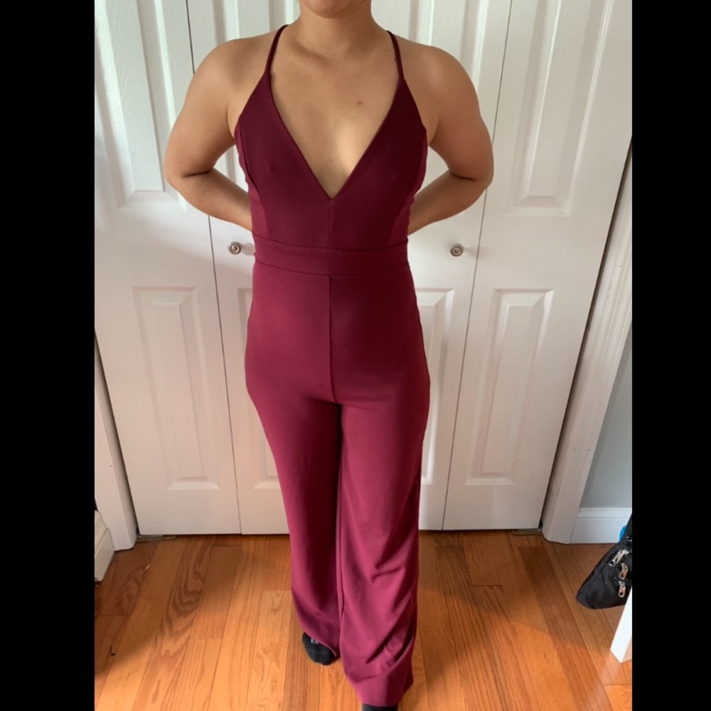 Maroon one piece . Lace back